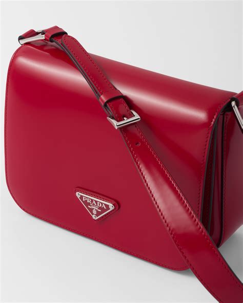 purple prada fold over cross over clutch.com bag|Prada leather backpack.